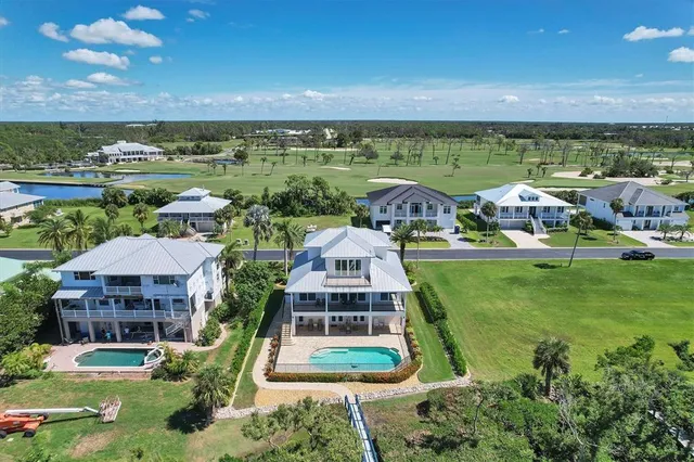 an aerial view of a house with a garden