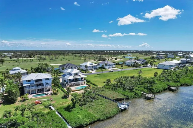 an aerial view of a house with a garden