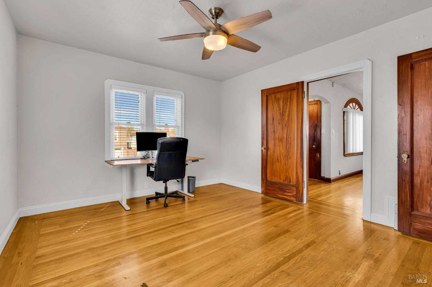 729 First Street Rodeo, CA 94572 - Photo 16 of 35 a view of a workspace with furniture and a window