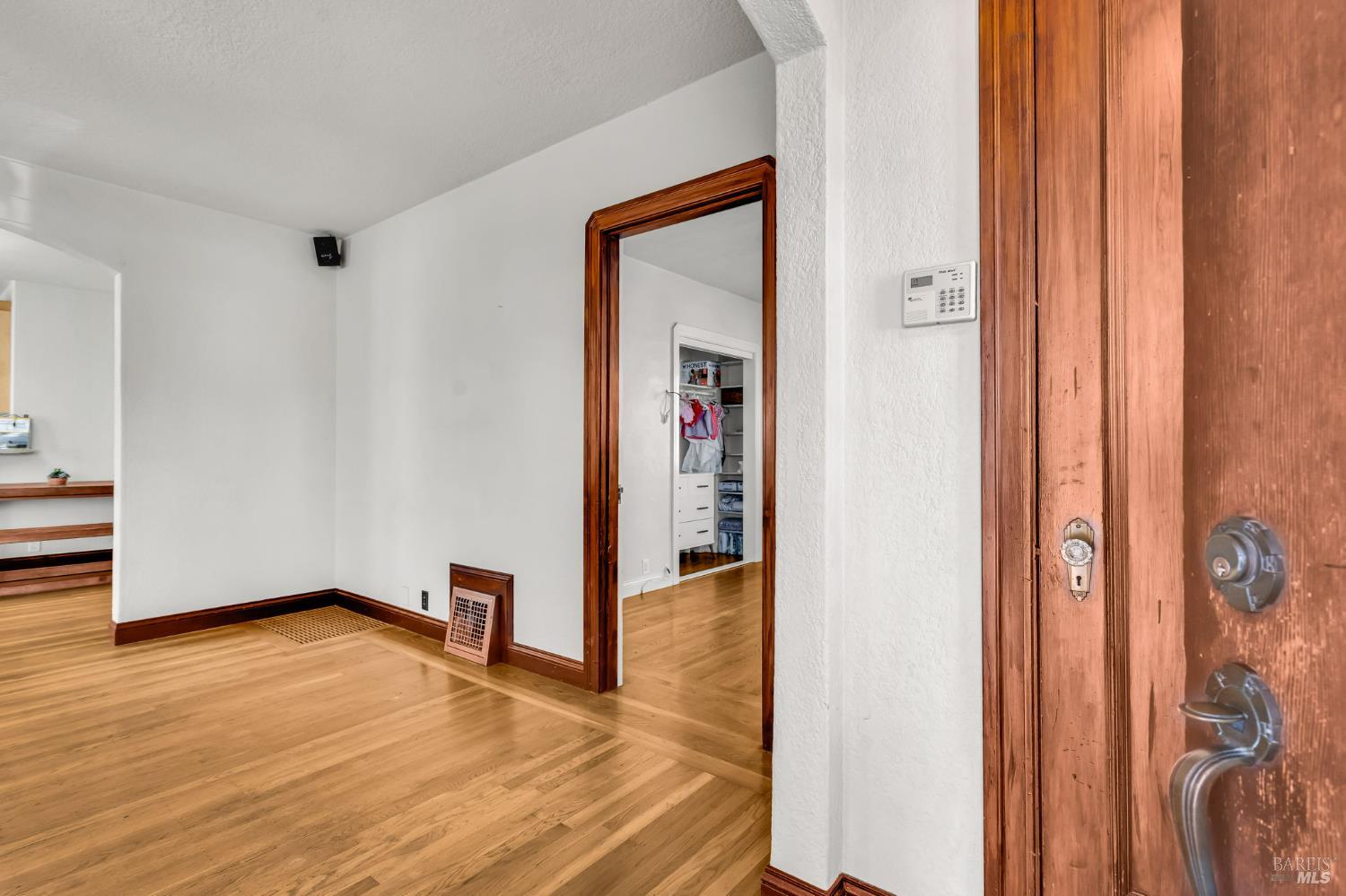 729 First Street Rodeo, CA 94572 - Photo 6 of 35 a view of a hallway with wooden floor