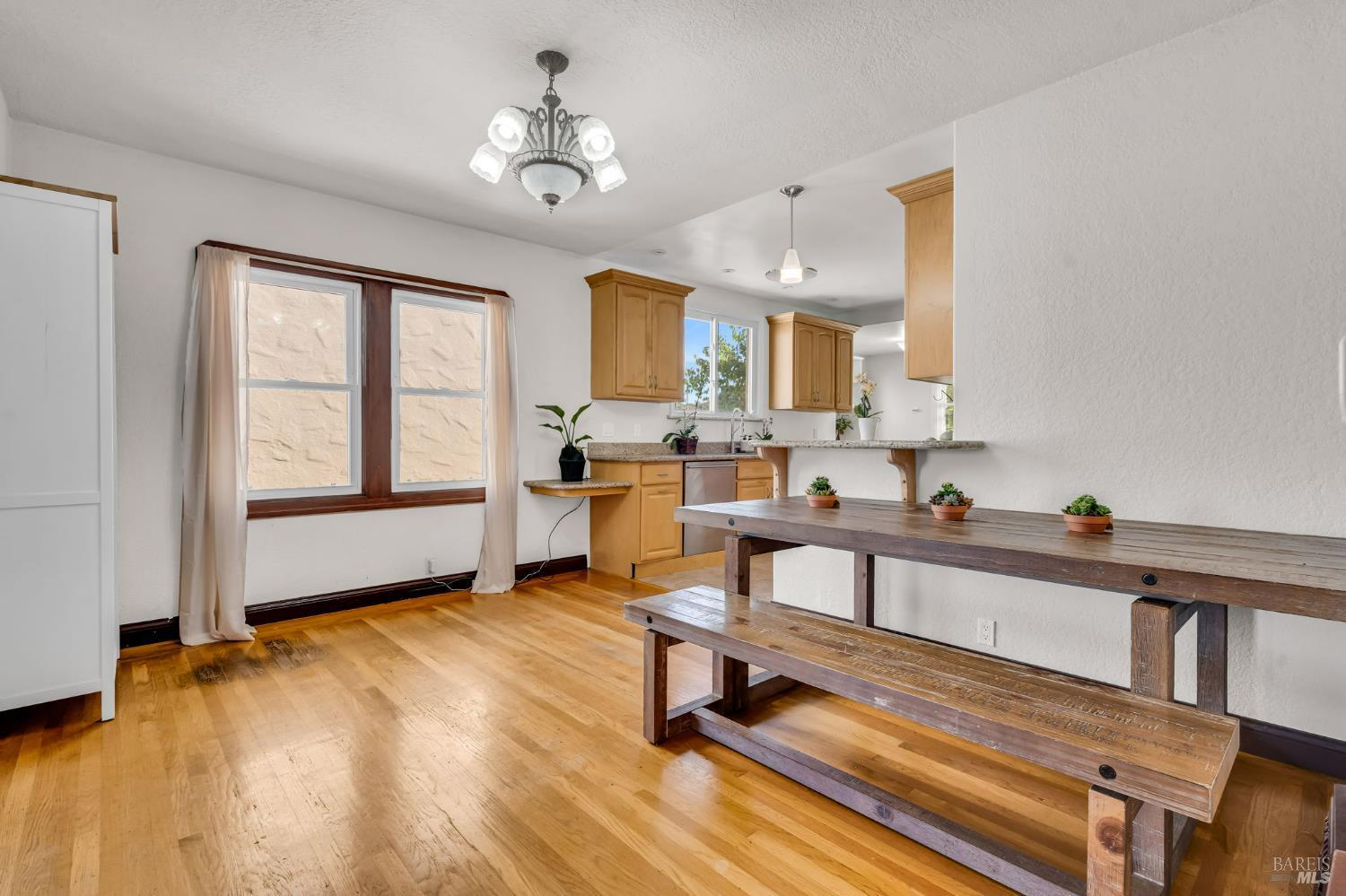 729 First Street Rodeo, CA 94572 - Photo 8 of 35 a view of a kitchen with workspace and a window