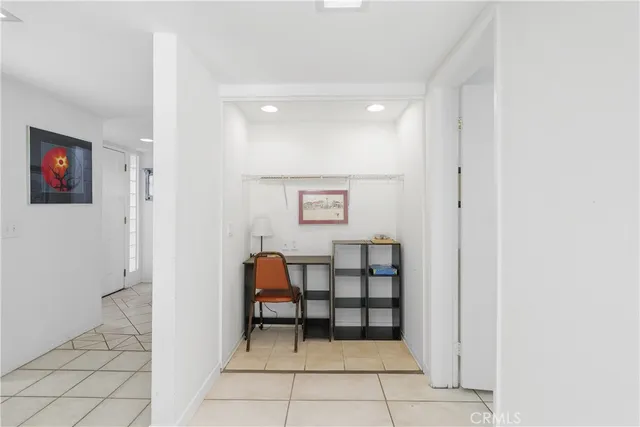 a view of a elevator and chairs