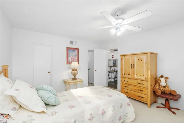 a bedroom with a bed and furniture