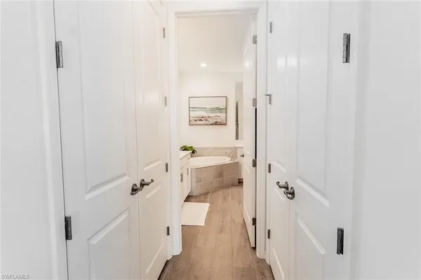 a bathroom with a bathtub and shower