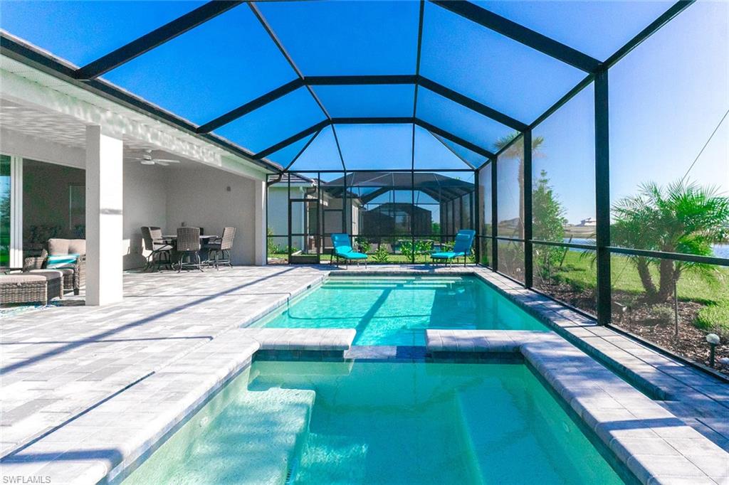 5534 Hampton Links Court Ave Maria, FL 34142 - Photo 3 of 50 a view of swimming pool with a patio