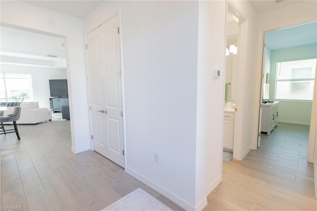 5534 Hampton Links Court Ave Maria, FL 34142 - Photo 32 of 50 a view of a bathroom with tub shower bedroom and bedroom