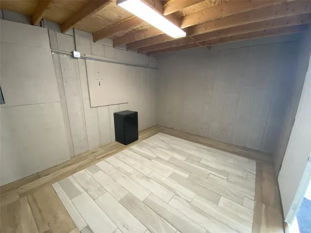 a view of a swimming pool with a yard