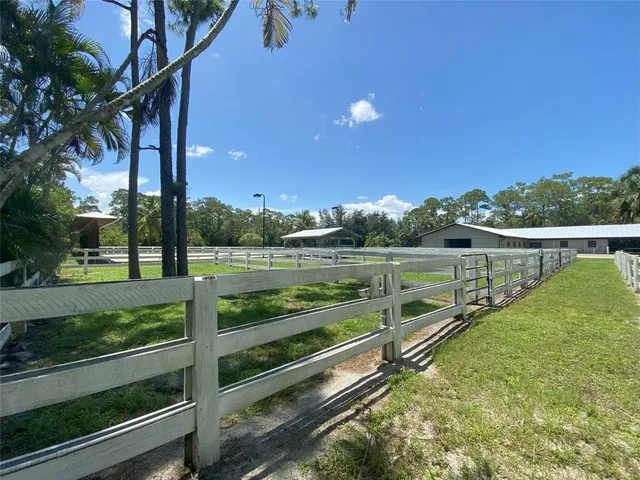 a view of a swimming pool with a porch