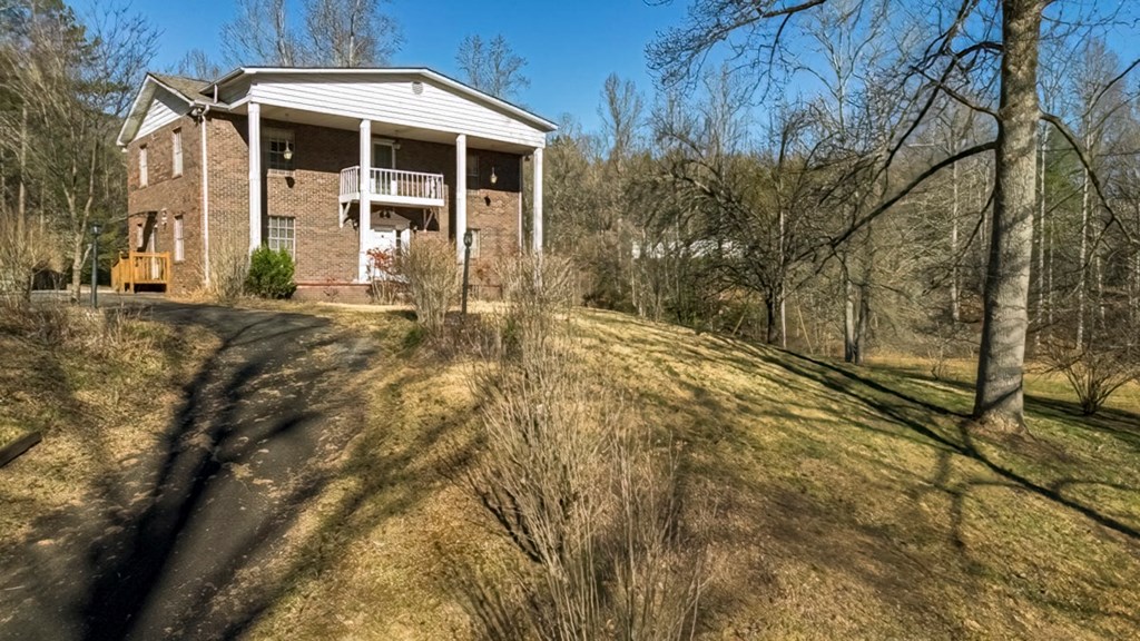 200 Mt Liberty Road McCaysville, GA 30555 - Photo 5 of 26 a front view of a house with a yard