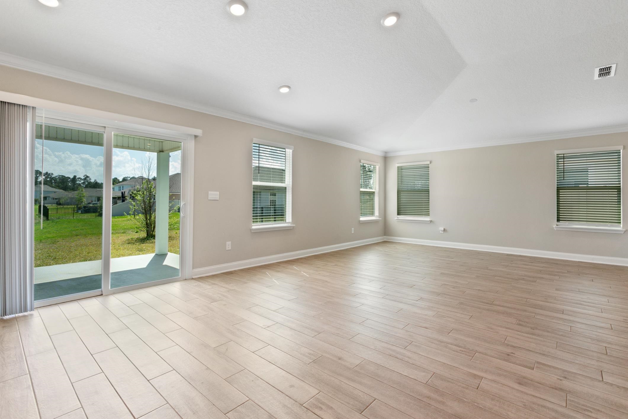 42 Huesca Court St. Augustine, FL 32084 - Photo 20 of 70 a view of an empty room with glass door and balcony