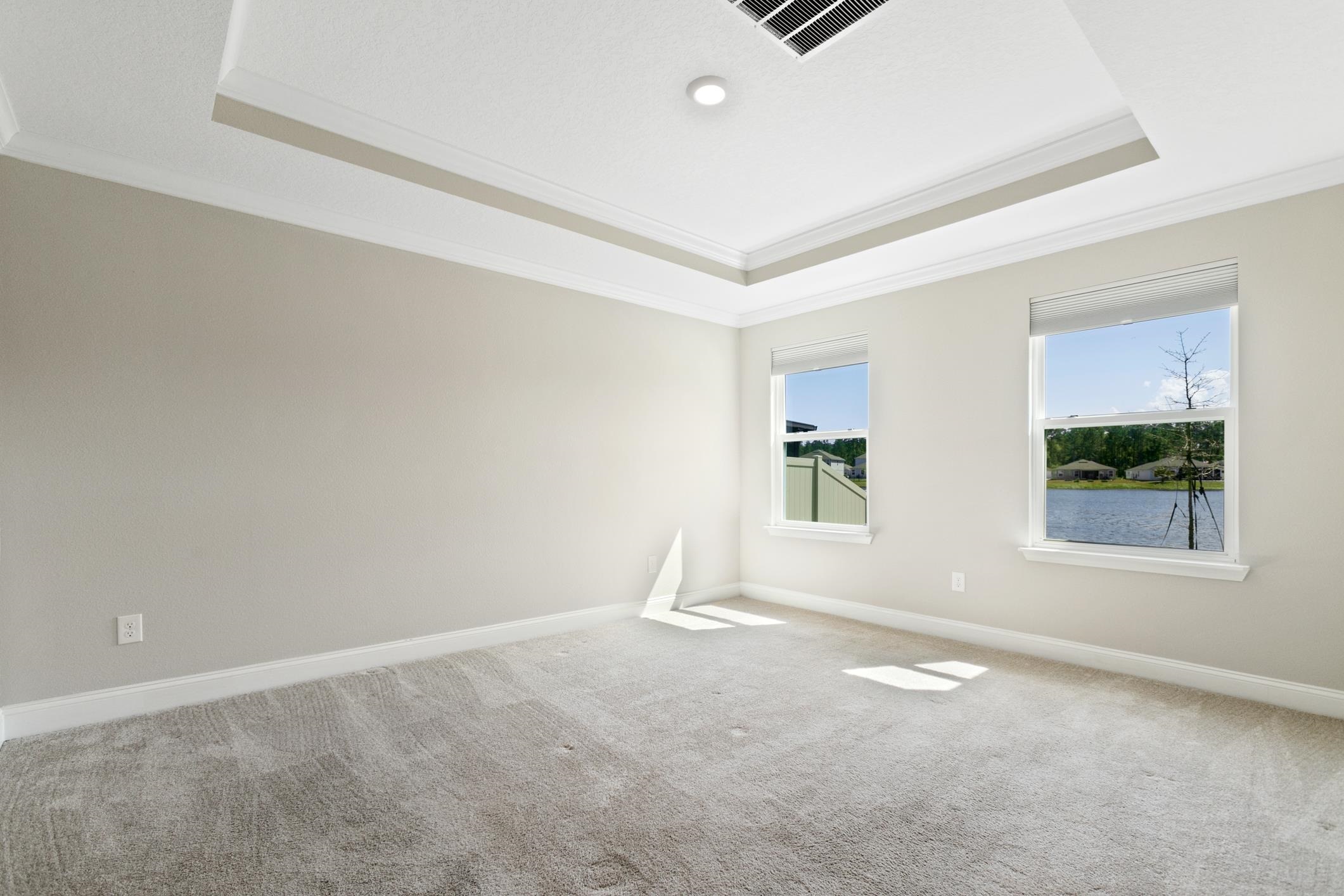 42 Huesca Court St. Augustine, FL 32084 - Photo 24 of 70 an empty room with a empty space and windows
