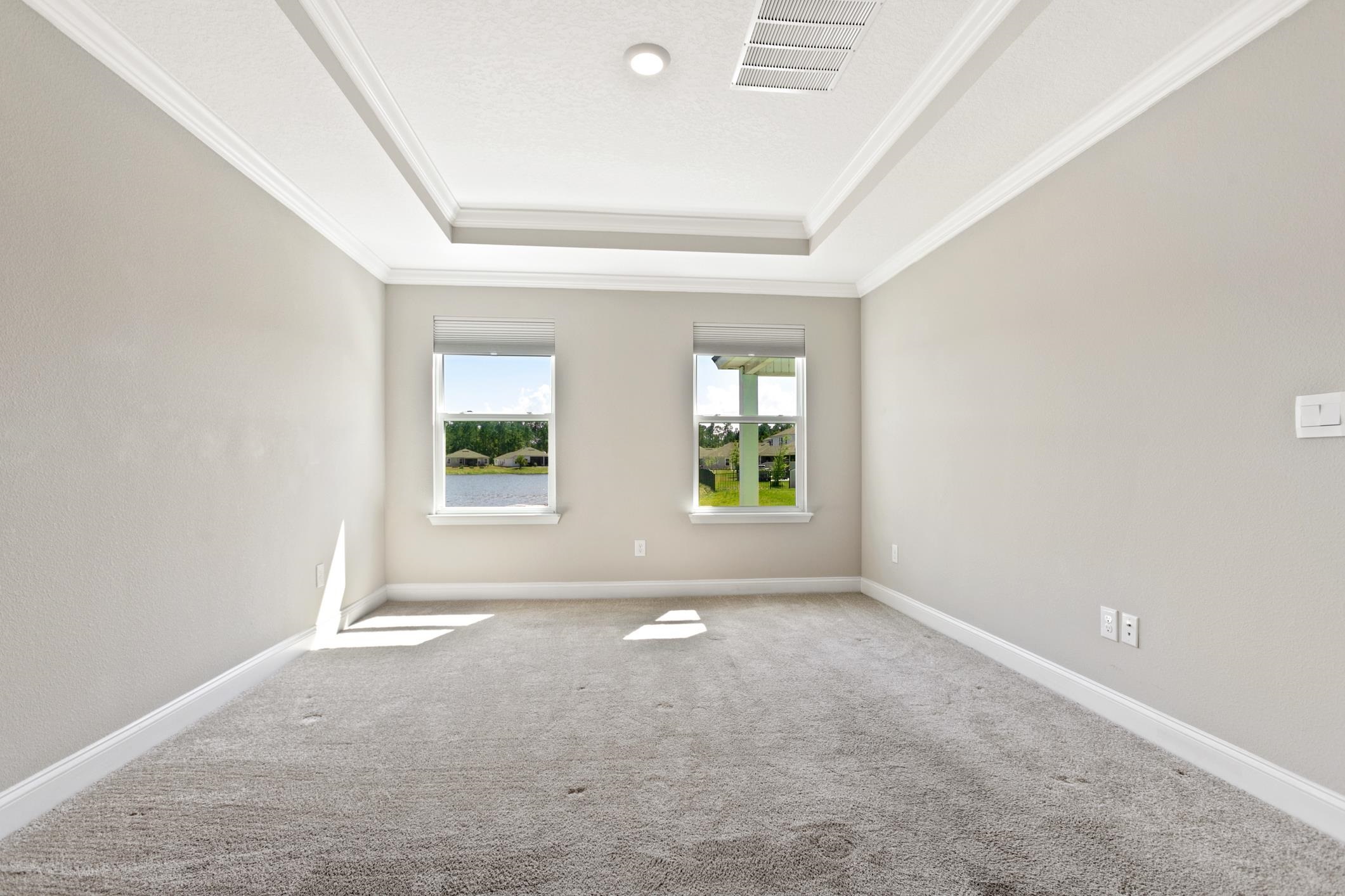 42 Huesca Court St. Augustine, FL 32084 - Photo 26 of 70 an empty room with windows and mirror