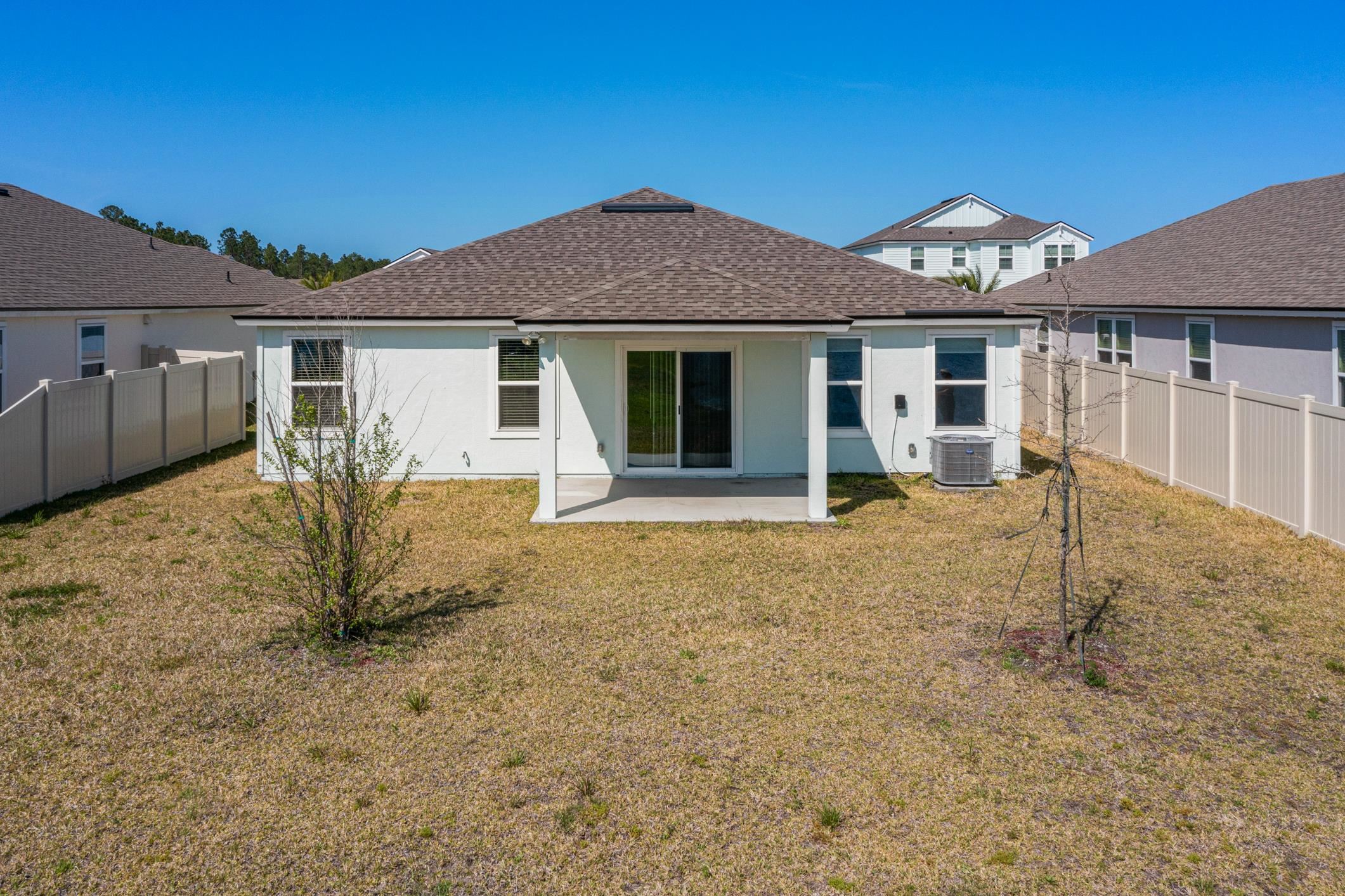 42 Huesca Court St. Augustine, FL 32084 - Photo 53 of 70 front view of a house with yard