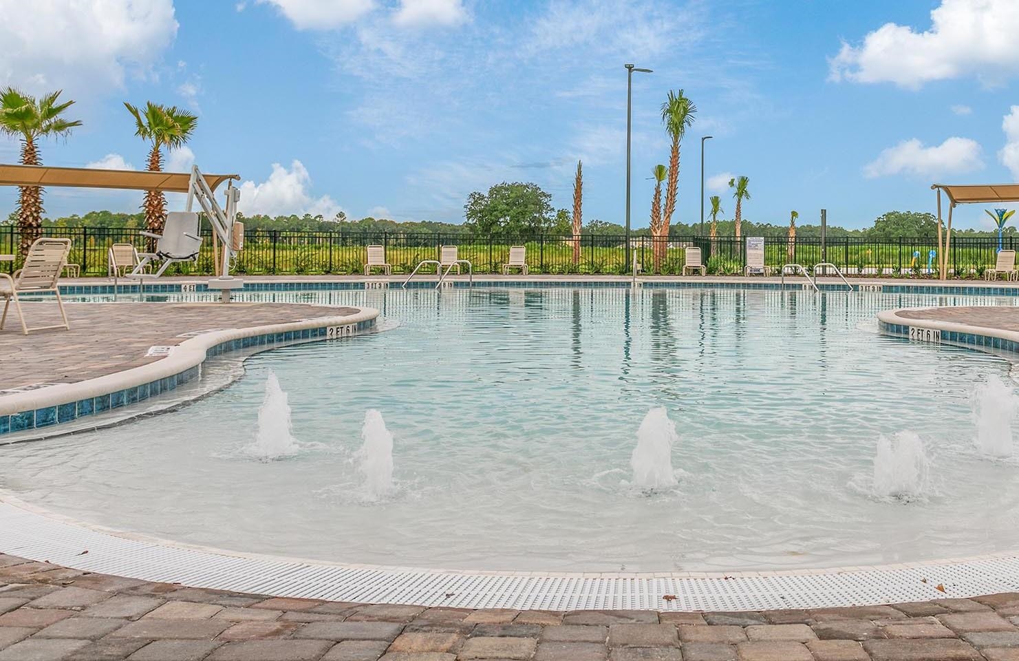 42 Huesca Court St. Augustine, FL 32084 - Photo 62 of 70 a view of a lake with a large building