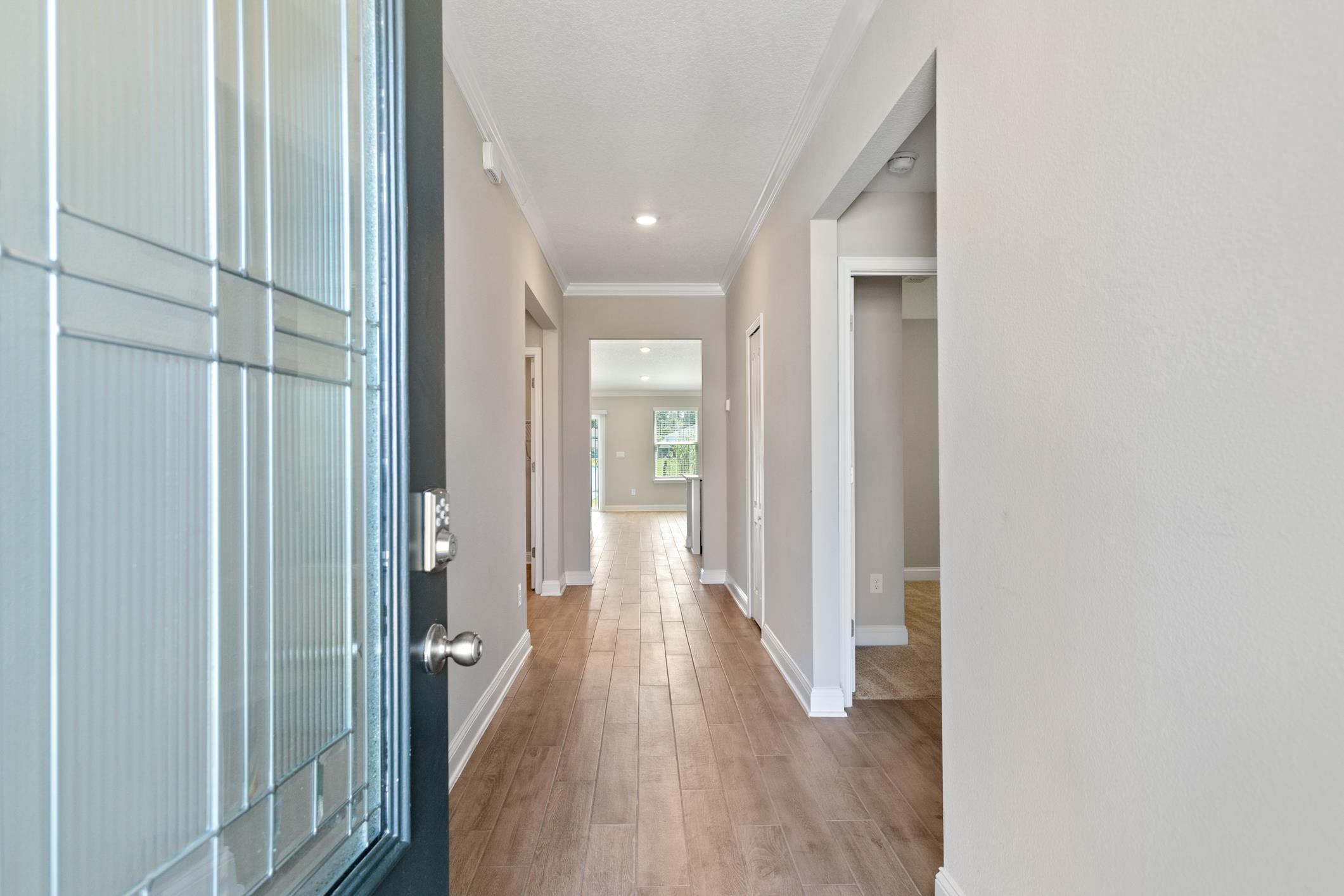 42 Huesca Court St. Augustine, FL 32084 - Photo 8 of 70 a view of a hallway with wooden floor