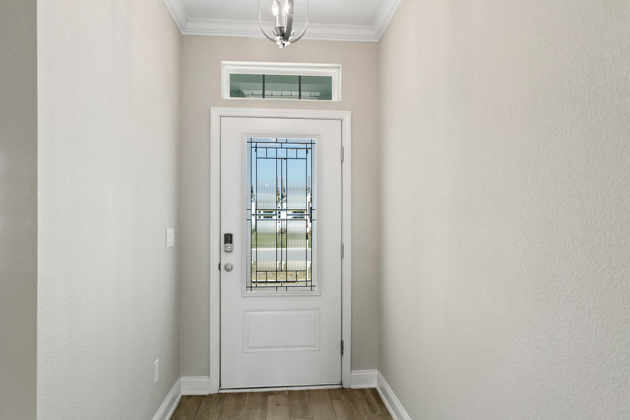 42 Huesca Court St. Augustine, FL 32084 - Photo 10 of 70 a view of front door with wooden floor