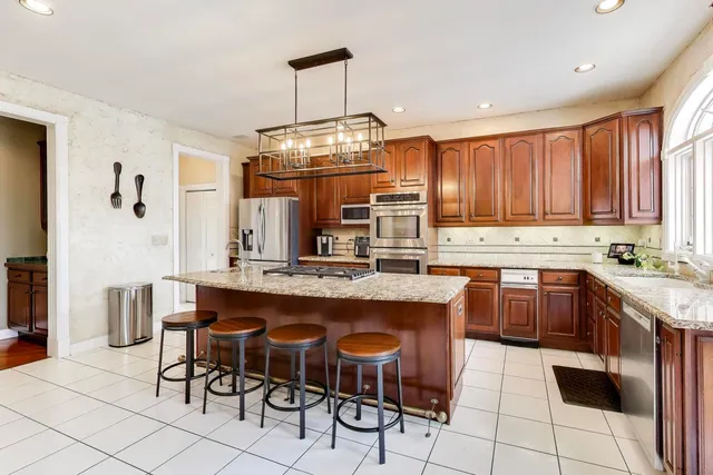 a bedroom with furniture and a fireplace