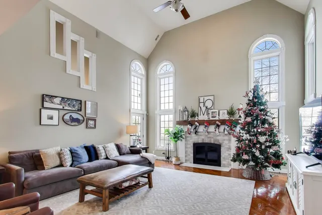 a bathroom with a toilet a sink a vanity and mirror