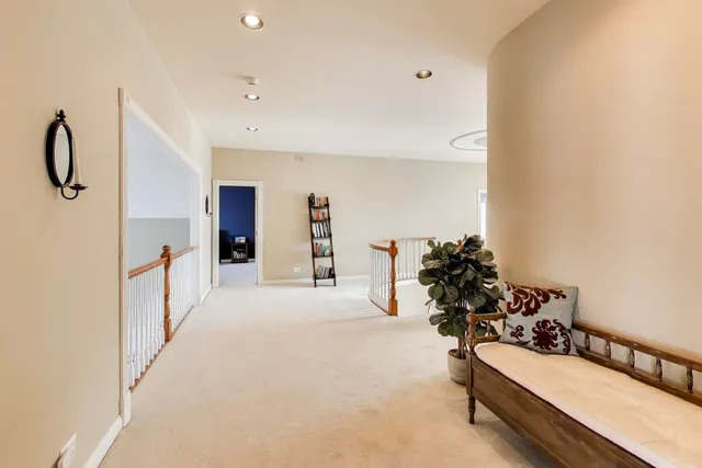 a bedroom with a bed and a mirror