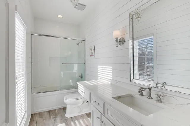 a gym room with lots of gym equipment