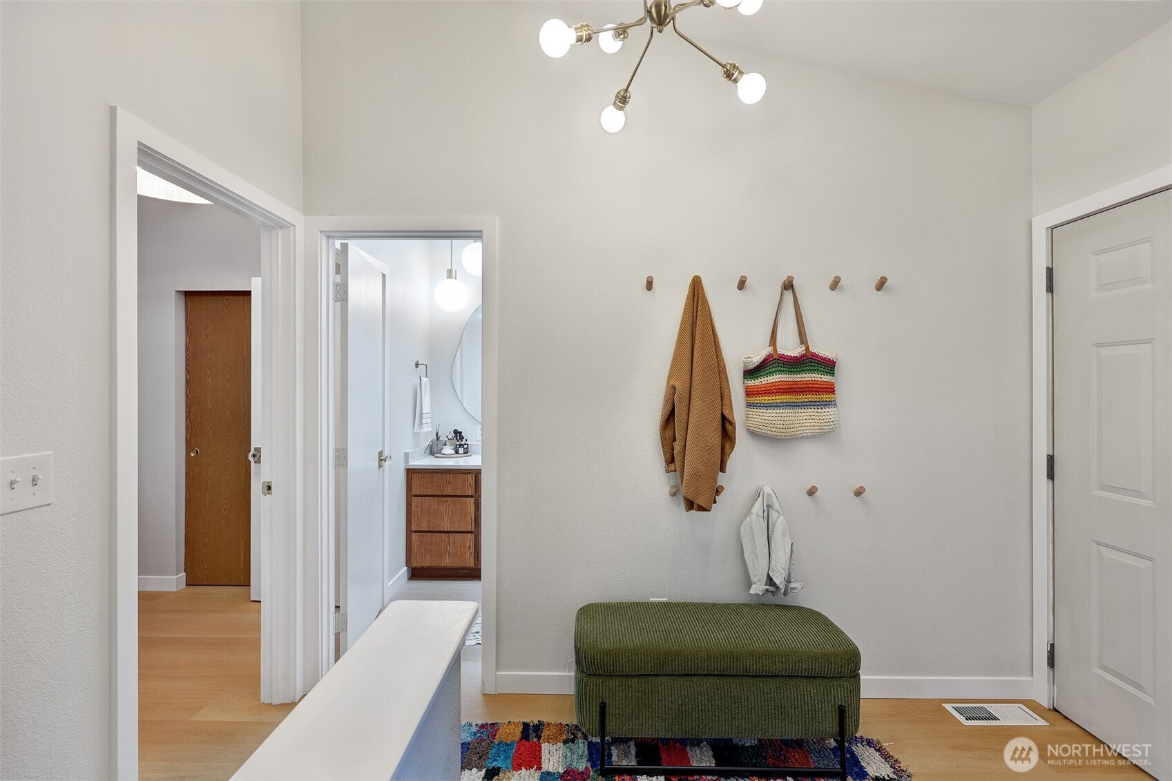 5126 South Garden Loop Road, Unit 11 Seattle, WA 98118 - Photo 16 of 36 a view of a hallway with seating area
