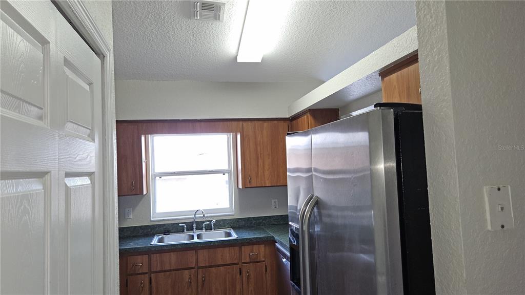 108 Brittany Road Mascotte, FL 34753 - Photo 5 of 17 a bathroom with a sink a granite top and a shower