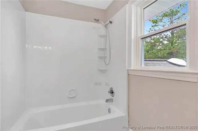 a bathroom with a bathtub