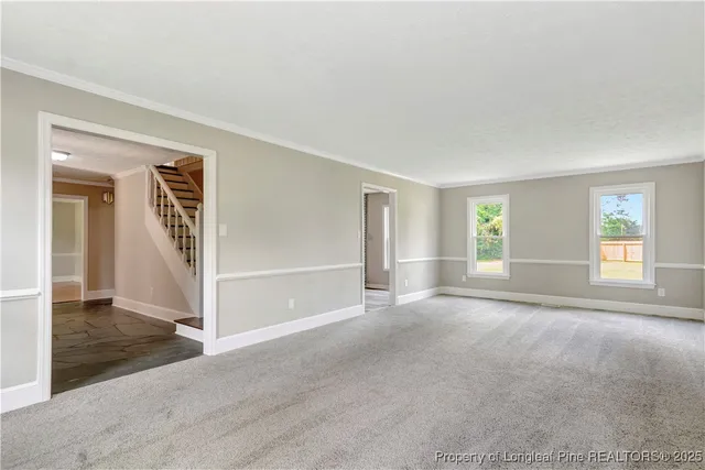 an empty room with windows