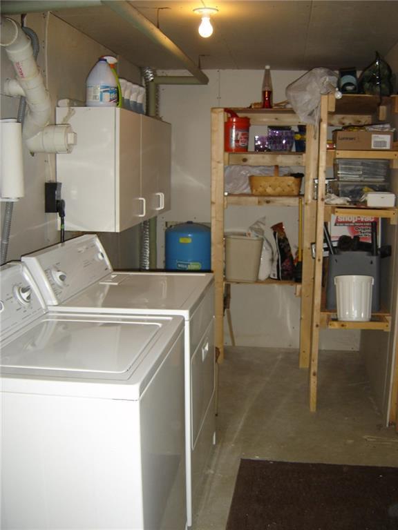 1069 North Berwick Road Wells, ME 04090 - Photo 24 of 32 LAUNDRY ROOM ANS STORAGE SHELVES