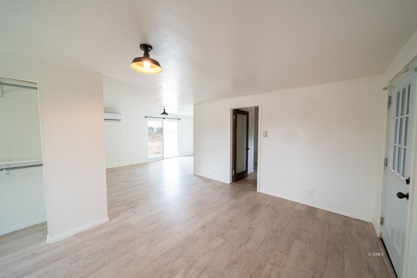 1424 Rademacher Way Ridgecrest, CA 93555 - Photo 19 of 23 a view of an empty room with a window