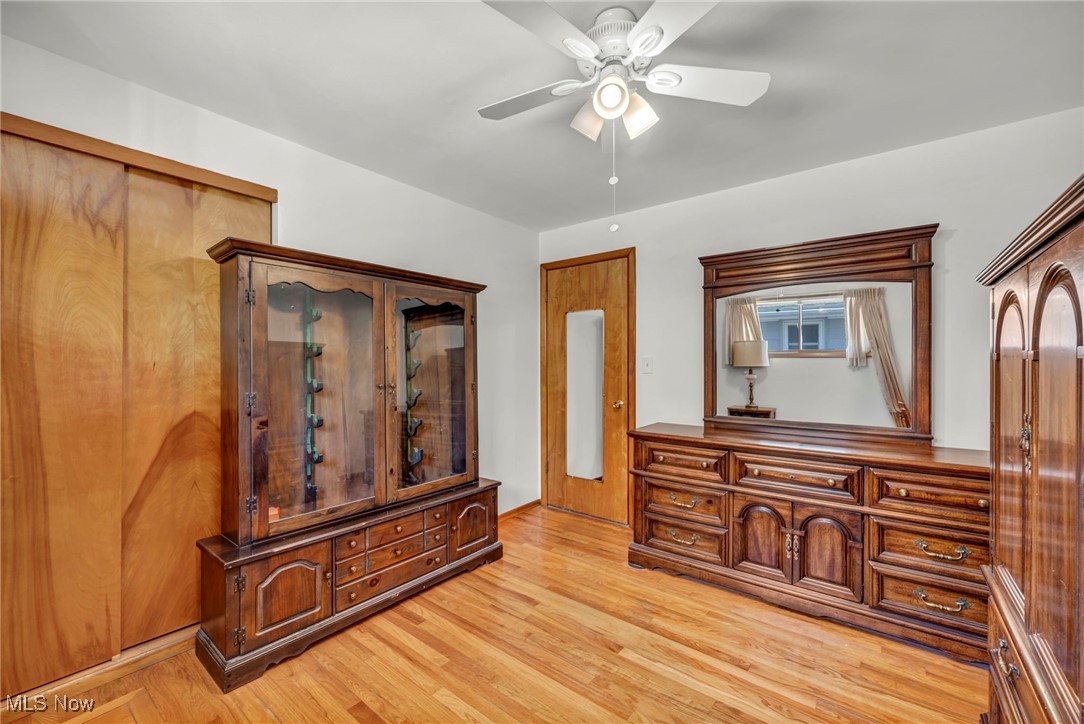 13732 Carpenter Road Garfield Heights, OH 44125 - Photo 19 of 46 Bedroom featuring light wood-style floors and a ceiling fan