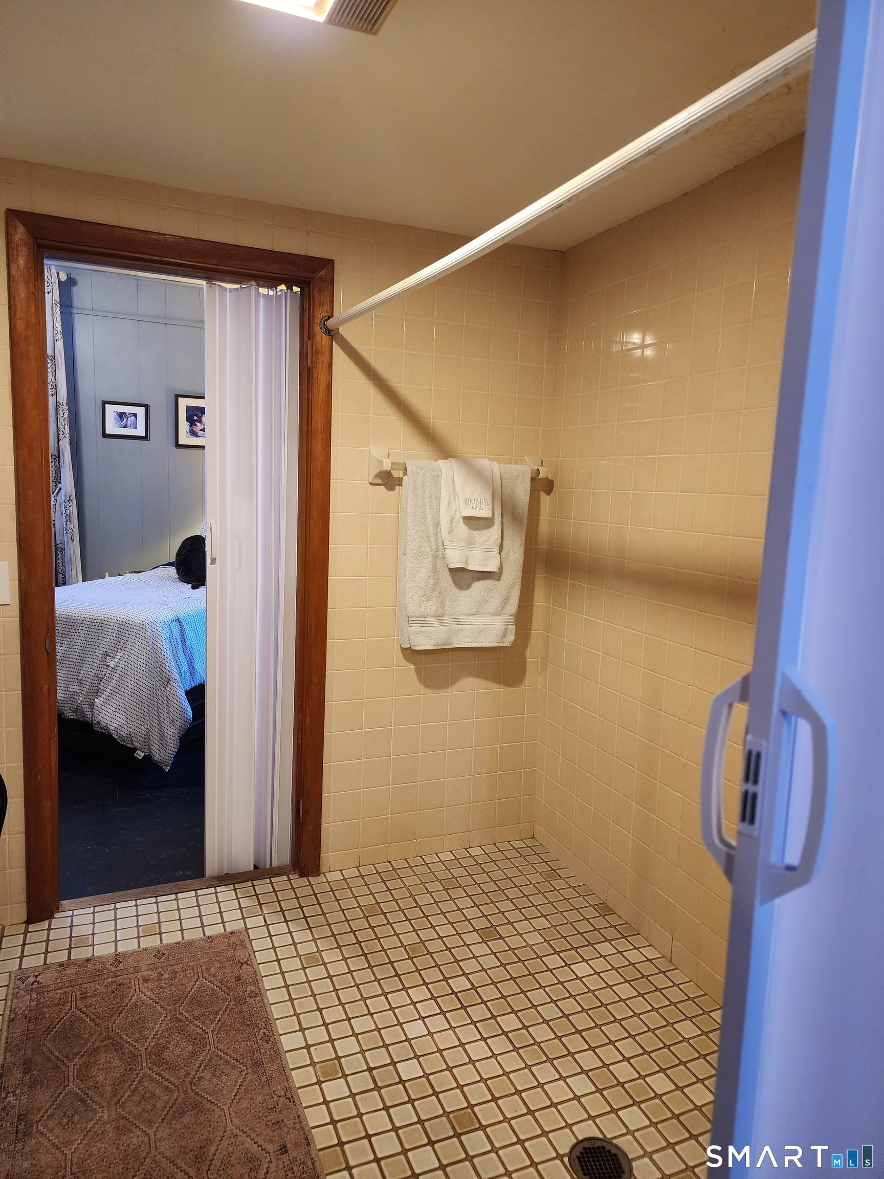 350 Hartford Pike Killingly, CT 06241 - Photo 14 of 28 a bedroom with a bed and a couch
