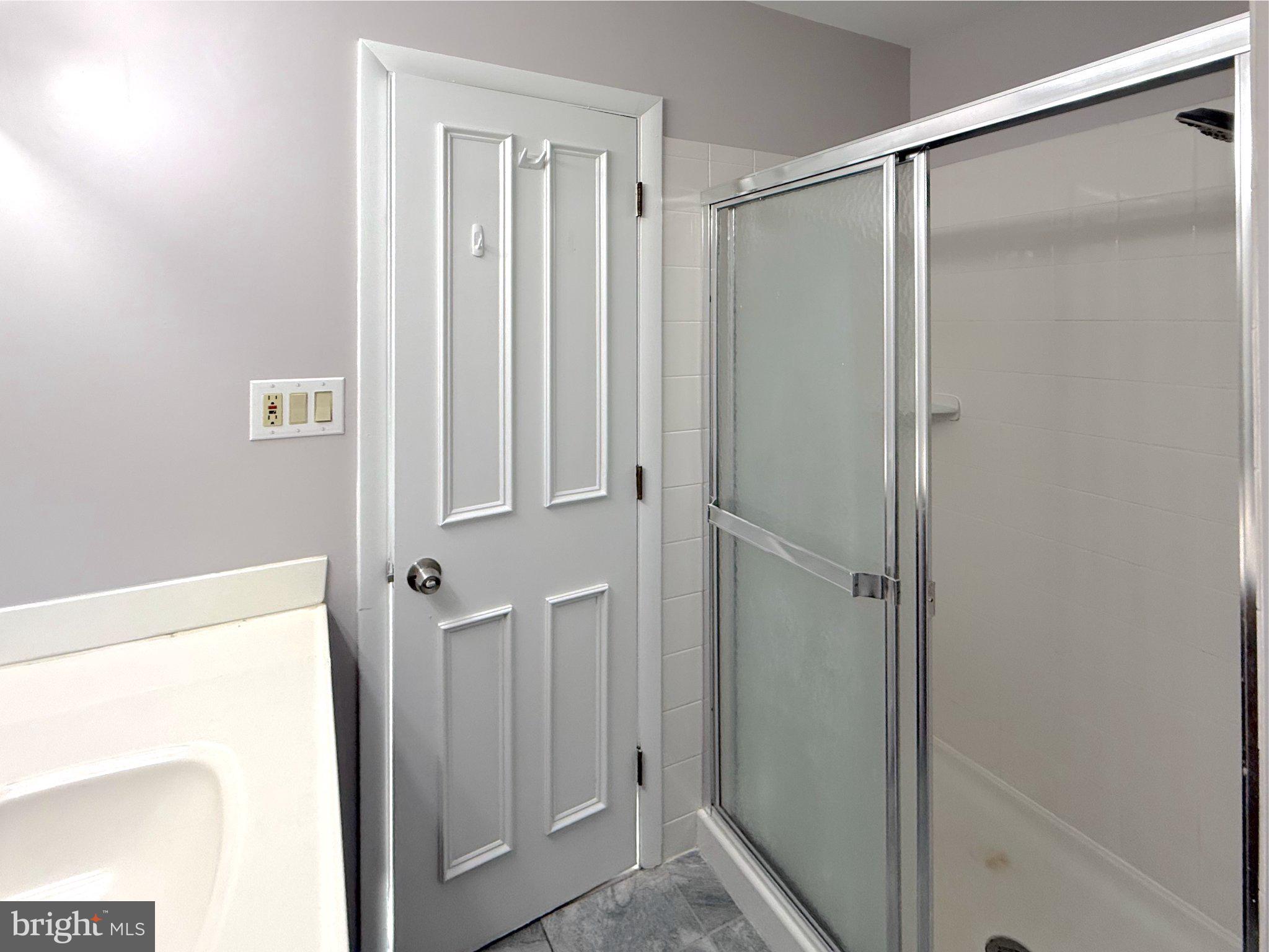 9006 Sidehill Road Ellicott City, MD 21042 - Photo 27 of 53 Modern bathroom with sleek design.