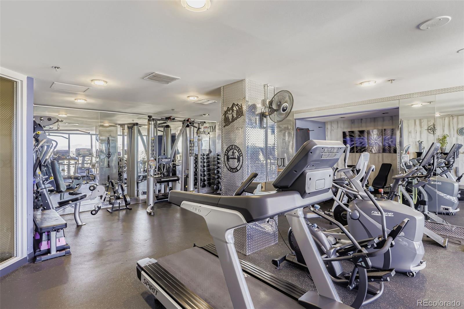 1625 Larimer Street, Unit 602 Denver, CO 80202 - Photo 17 of 22 a view of a room with gym equipment