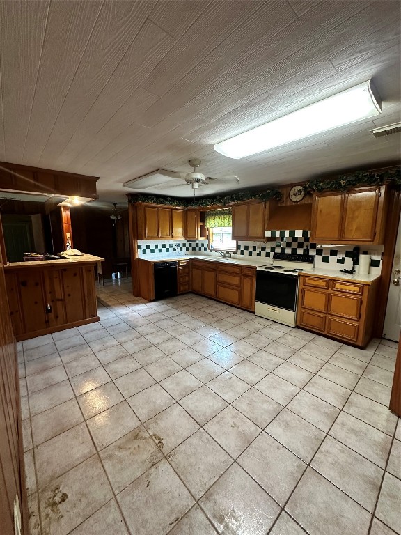 2221 South Front Street Angleton, TX 77515 - Photo 4 of 26 a kitchen with stainless steel appliances kitchen island granite countertop a sink and cabinets