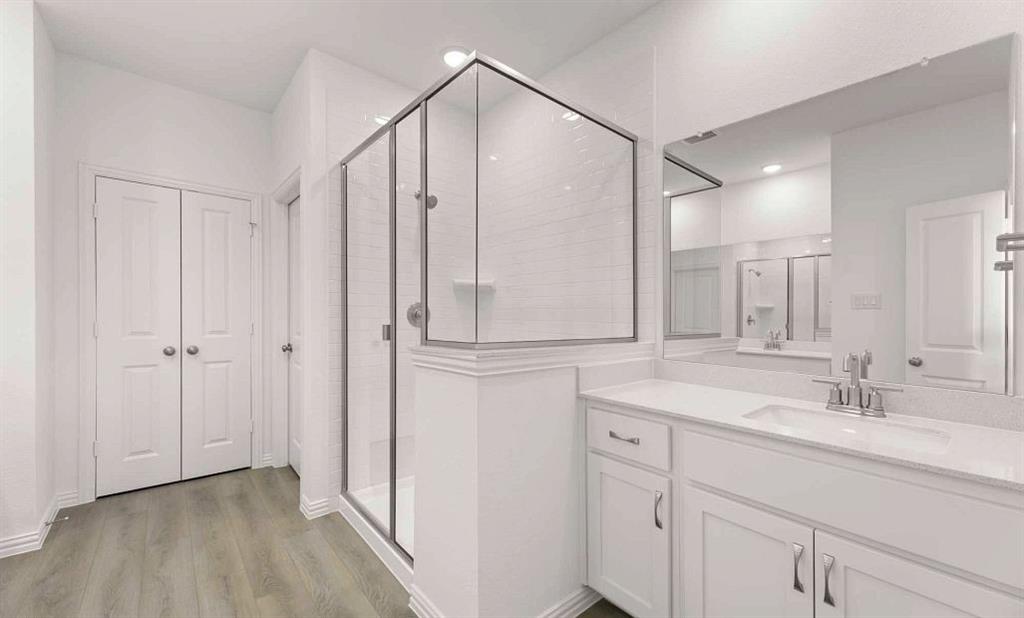 633 Blue Rdg Drive Mansfield, TX 76063 - Photo 11 of 17 a bathroom with a shower sink and mirror