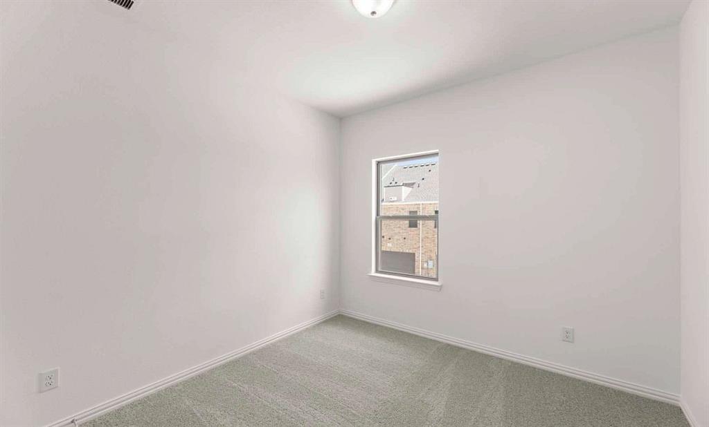 633 Blue Rdg Drive Mansfield, TX 76063 - Photo 15 of 17 an empty room with windows