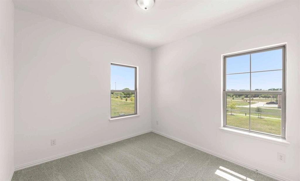 633 Blue Rdg Drive Mansfield, TX 76063 - Photo 16 of 17 an empty room with windows