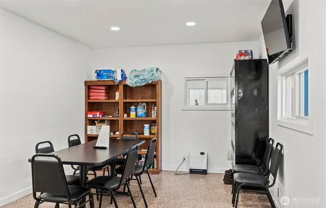 a view of a dining room with furniture