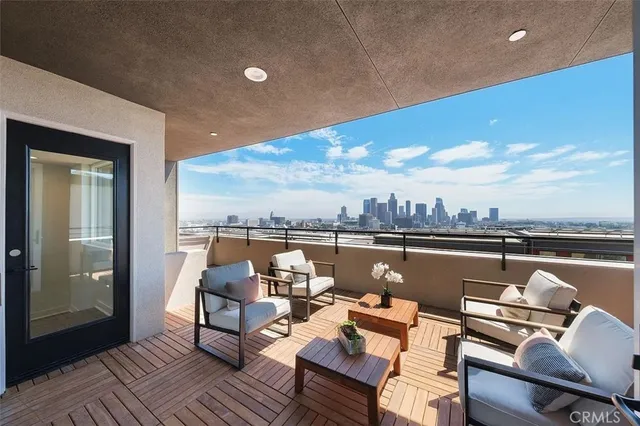 a view of a terrace with furniture