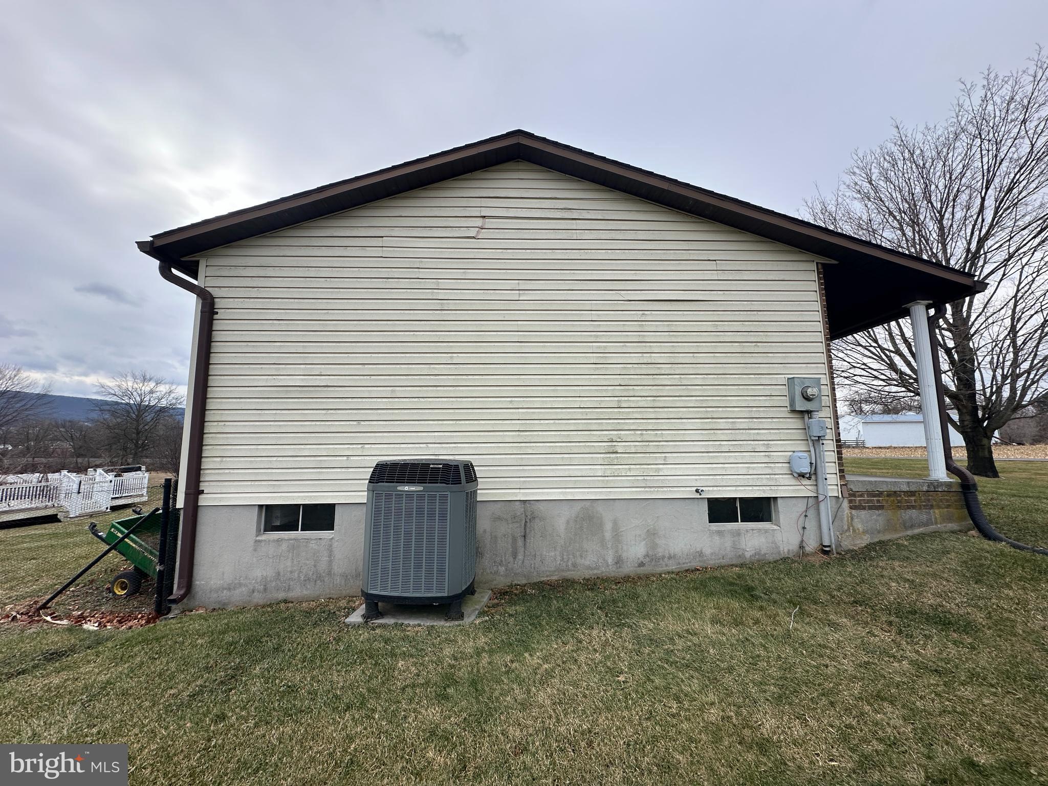 12103 Itnyre Road Smithsburg, MD 21783 - Photo 11 of 84 a front view of a house with a yard