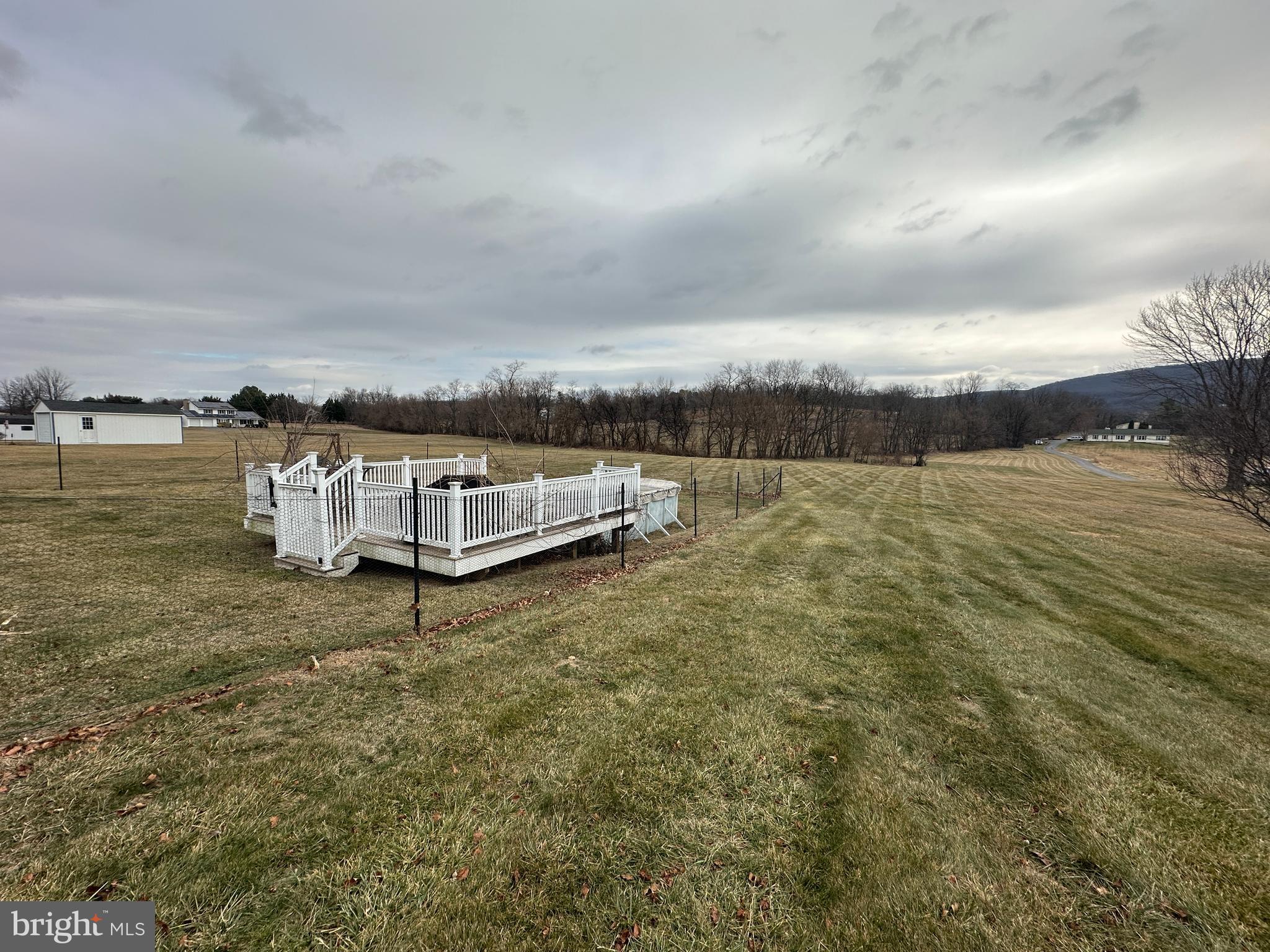 12103 Itnyre Road Smithsburg, MD 21783 - Photo 26 of 84 a view of a lake with houses in back