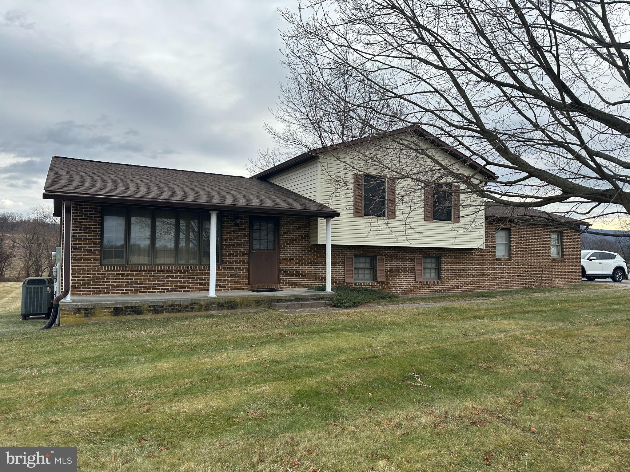 12103 Itnyre Road Smithsburg, MD 21783 - Photo 3 of 84 a front view of a house with a yard