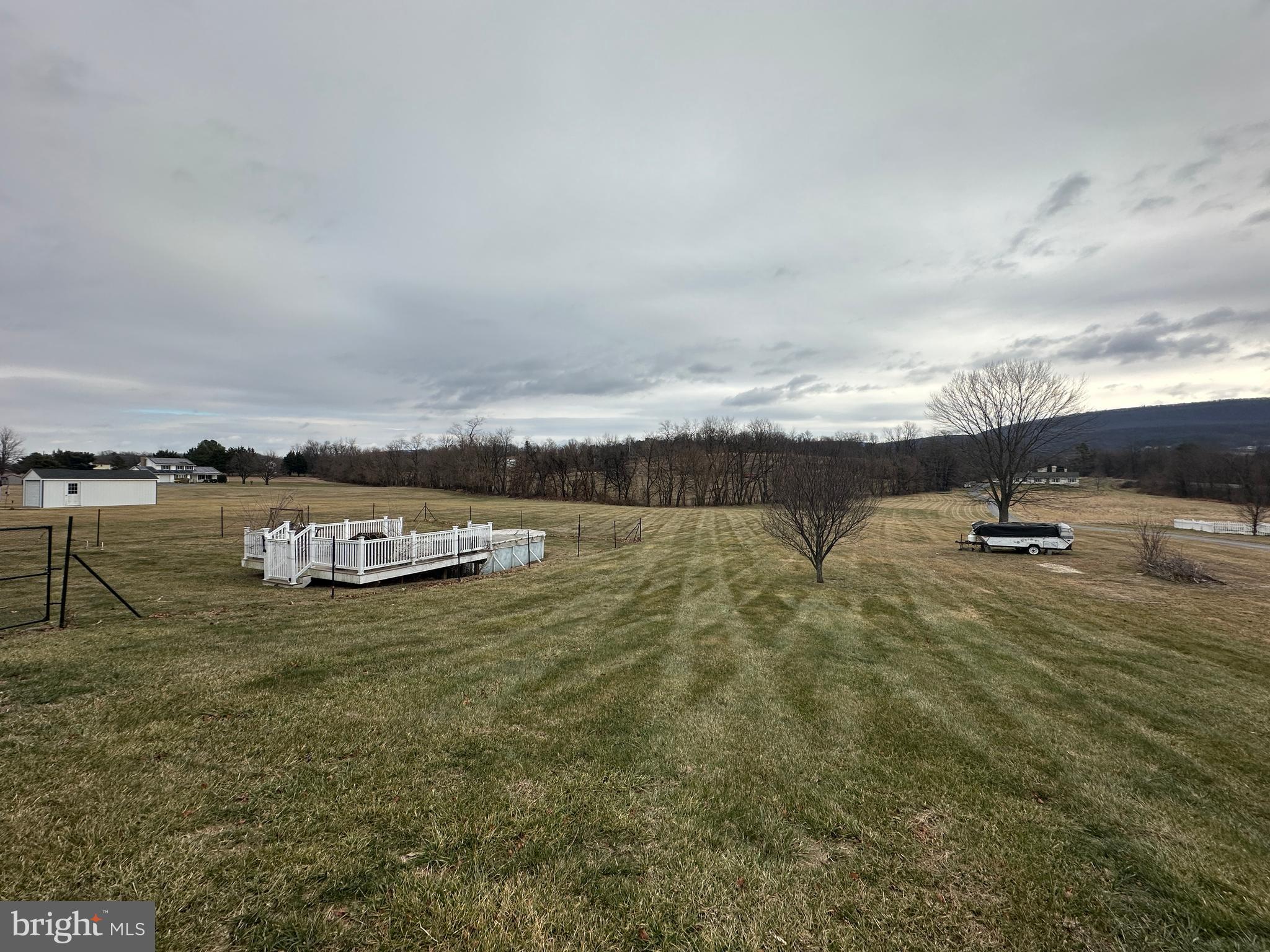 12103 Itnyre Road Smithsburg, MD 21783 - Photo 40 of 84 a view of a lake with houses in back