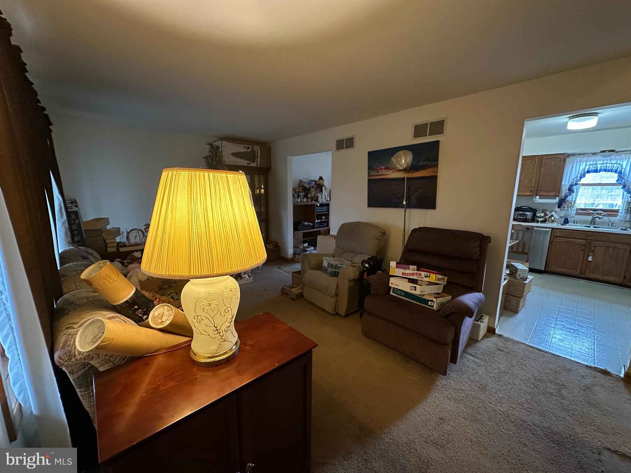 12103 Itnyre Road Smithsburg, MD 21783 - Photo 41 of 84 a living room with furniture and a flat screen tv