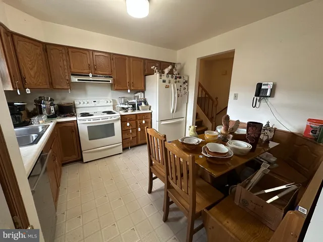 a room with gym equipment and mirror