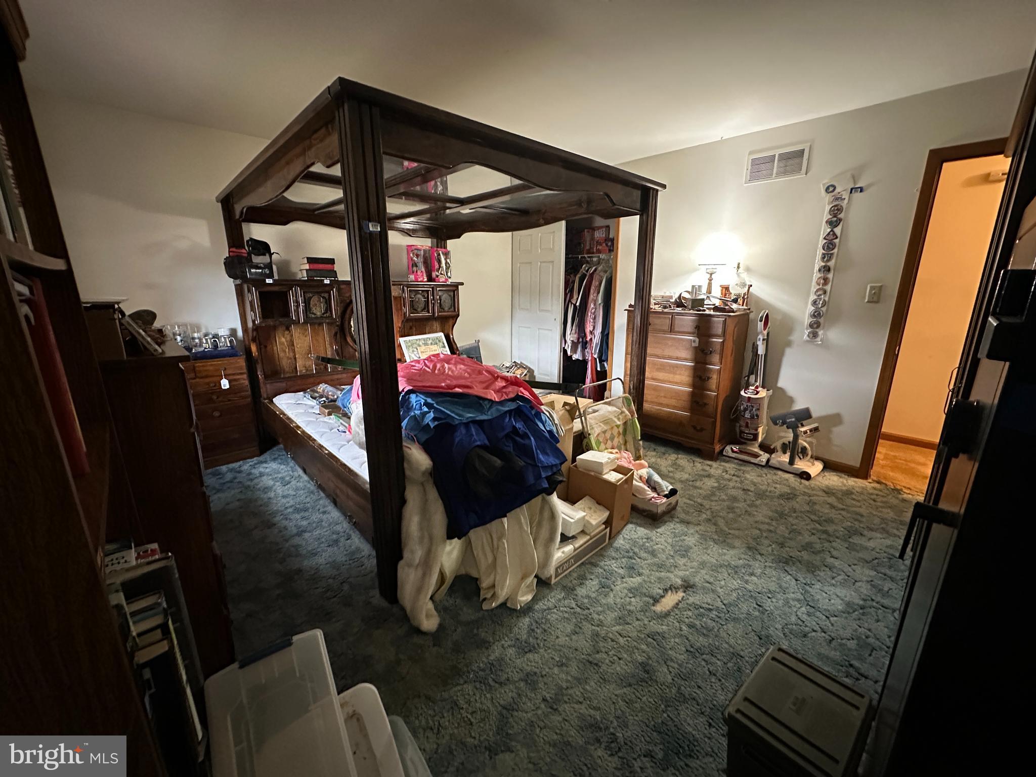 12103 Itnyre Road Smithsburg, MD 21783 - Photo 52 of 84 a bedroom with double bunk beds and glass door