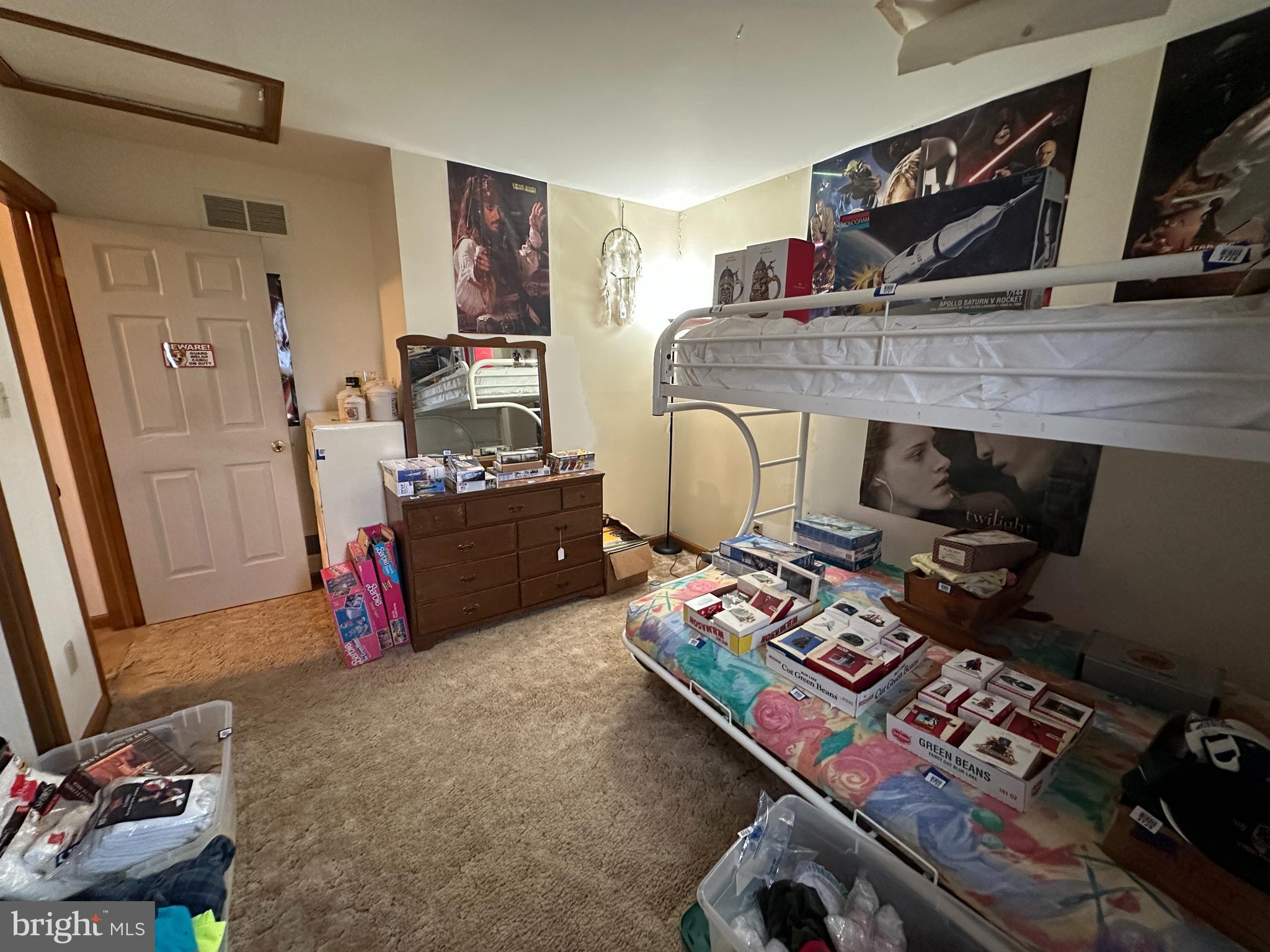 12103 Itnyre Road Smithsburg, MD 21783 - Photo 57 of 84 a living room with furniture and a flat screen tv