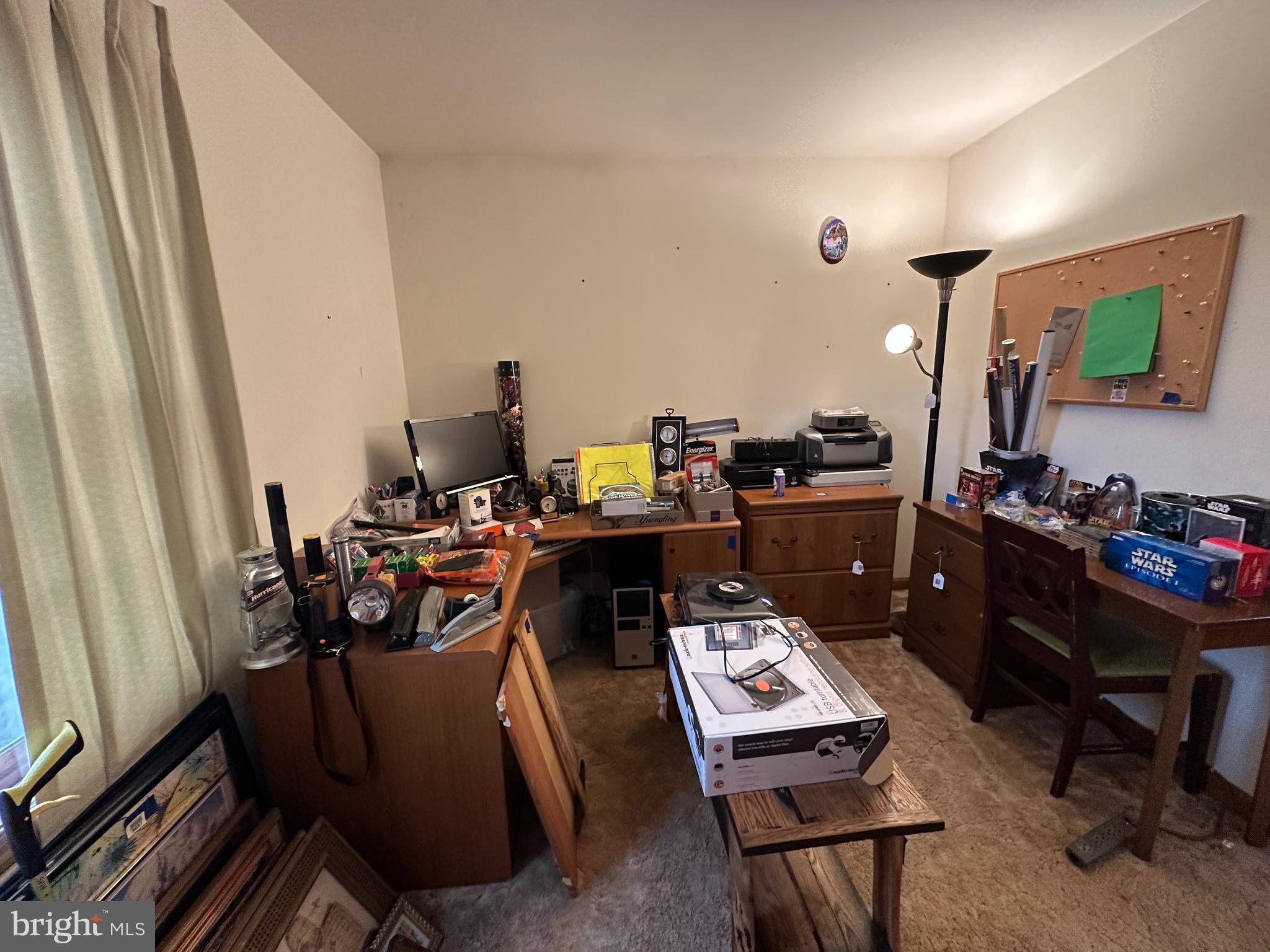 12103 Itnyre Road Smithsburg, MD 21783 - Photo 60 of 84 a living room with furniture and a flat screen tv