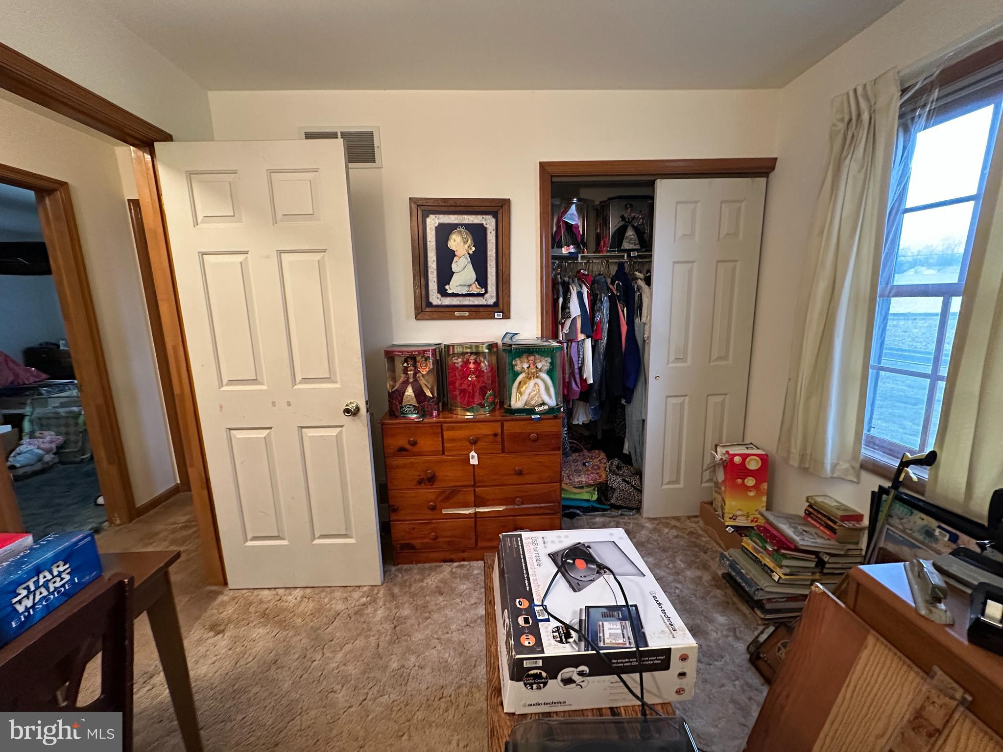 12103 Itnyre Road Smithsburg, MD 21783 - Photo 61 of 84 a bedroom with furniture and a window